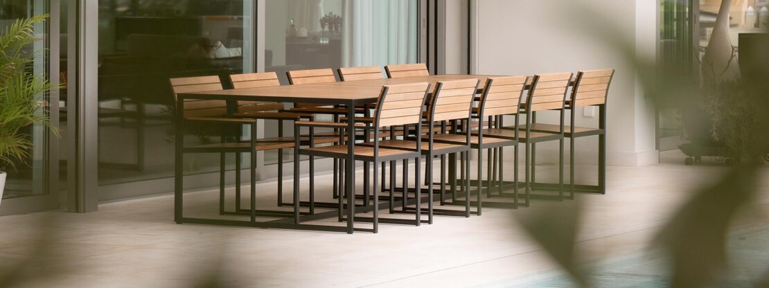 Image of Roshults Garden Bistro 10 place dining table and chairs in teak and anthracite stainless steel
