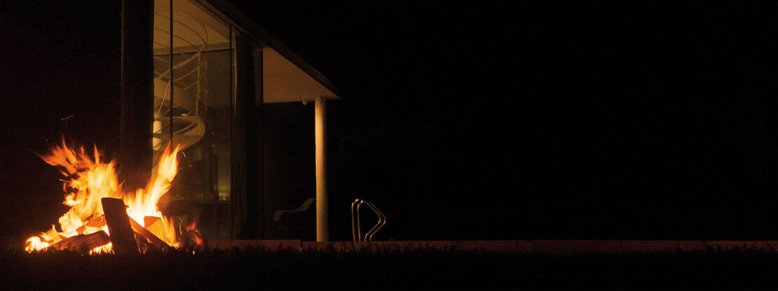 Image of flames of AK47 Hole fire pit, seemingly emerging from ground beneath