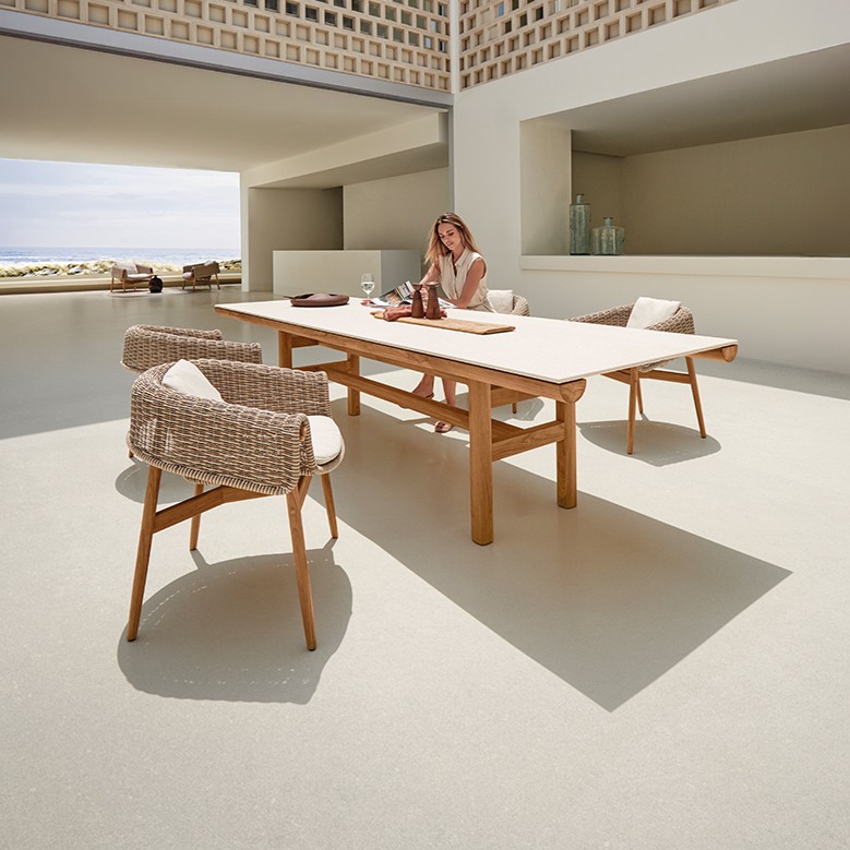 Image of Gloster Wrap garden chairs and Rail dining table