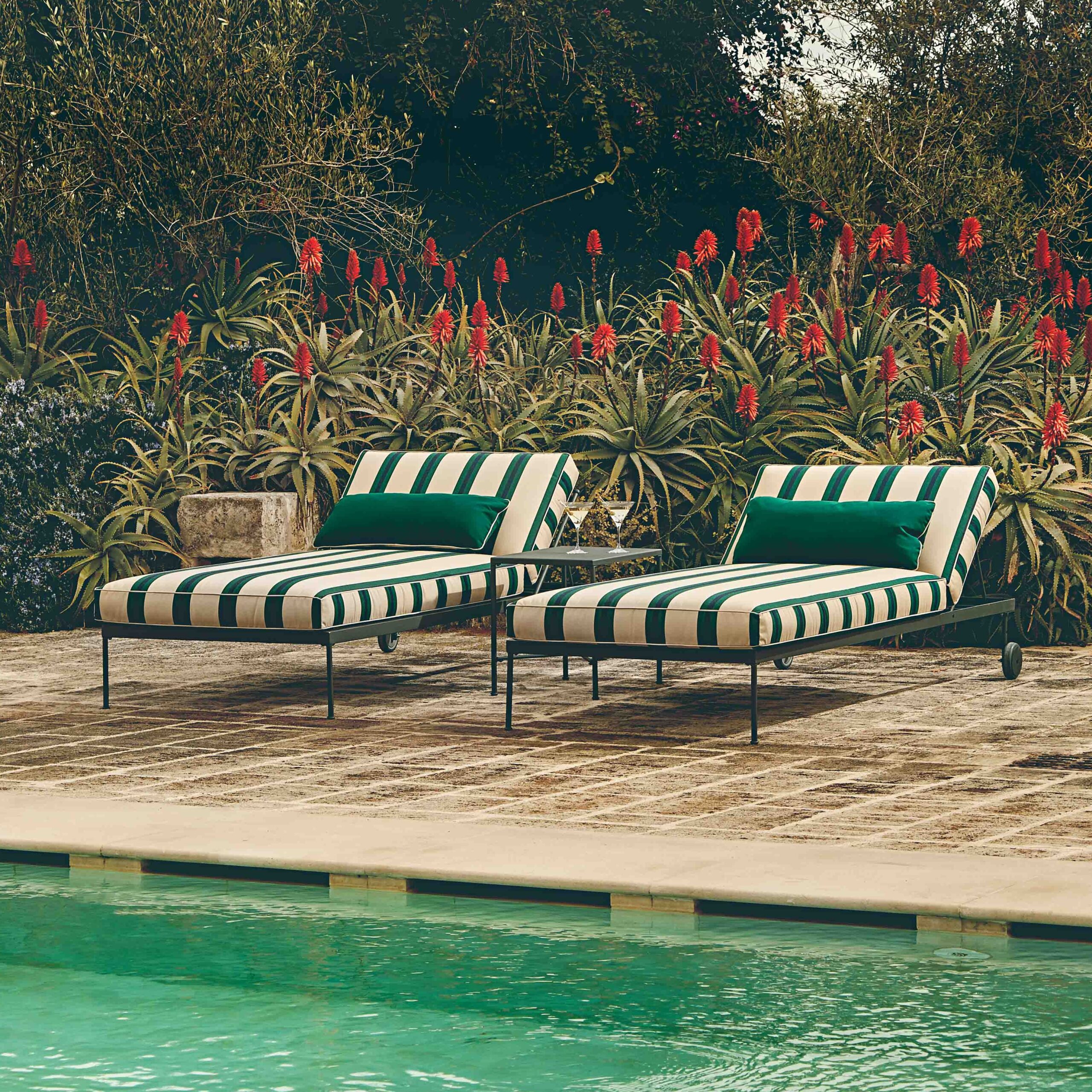 Image of Unopiu Igea sunbeds with striped fabric on poolside